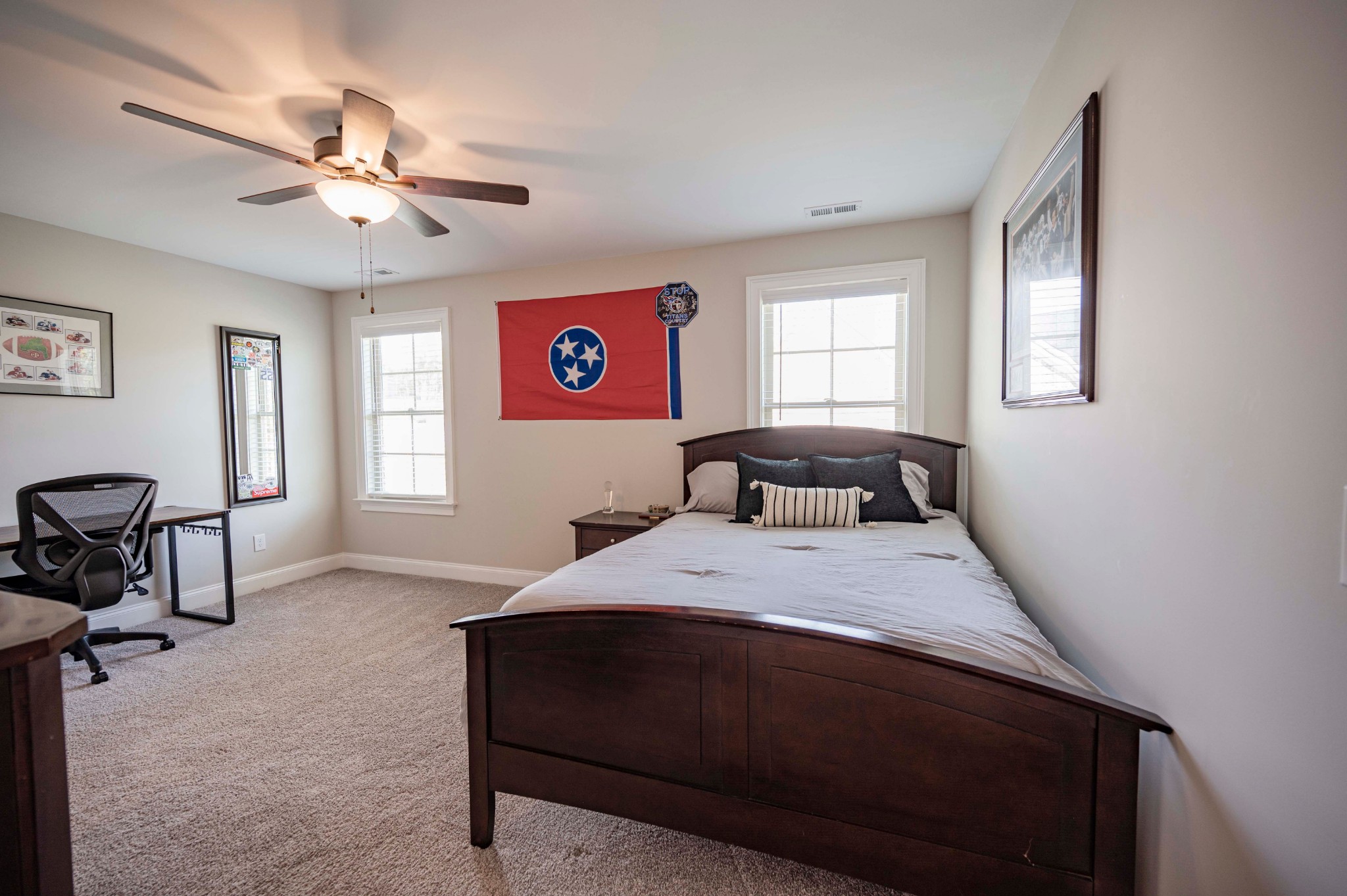 128 Seclusion Court Murfreesboro, TN 37129 - Photo 37 of 68 a bedroom with a bed and a chandelier