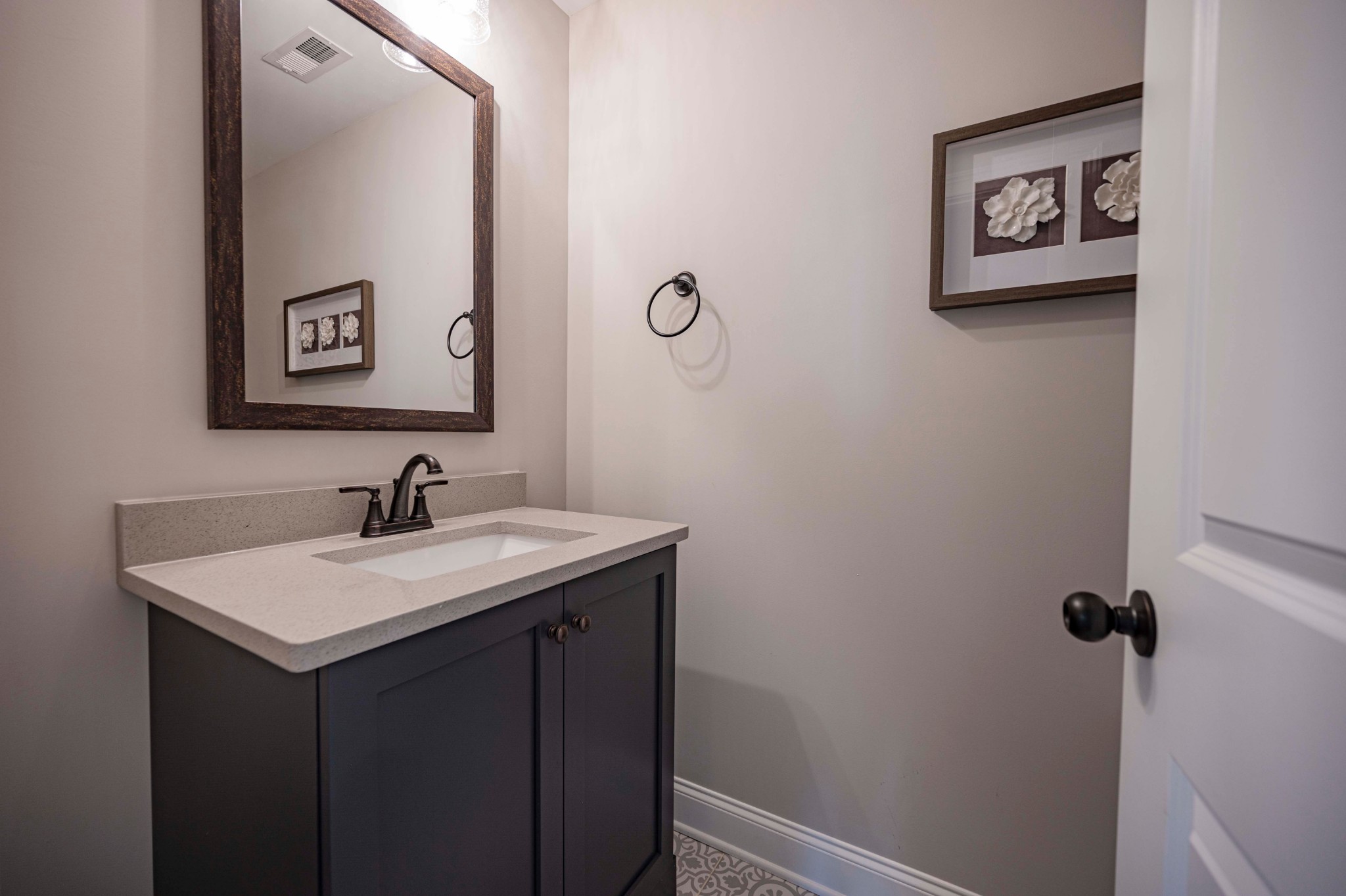 128 Seclusion Court Murfreesboro, TN 37129 - Photo 38 of 68 a bathroom with a sink and a mirror