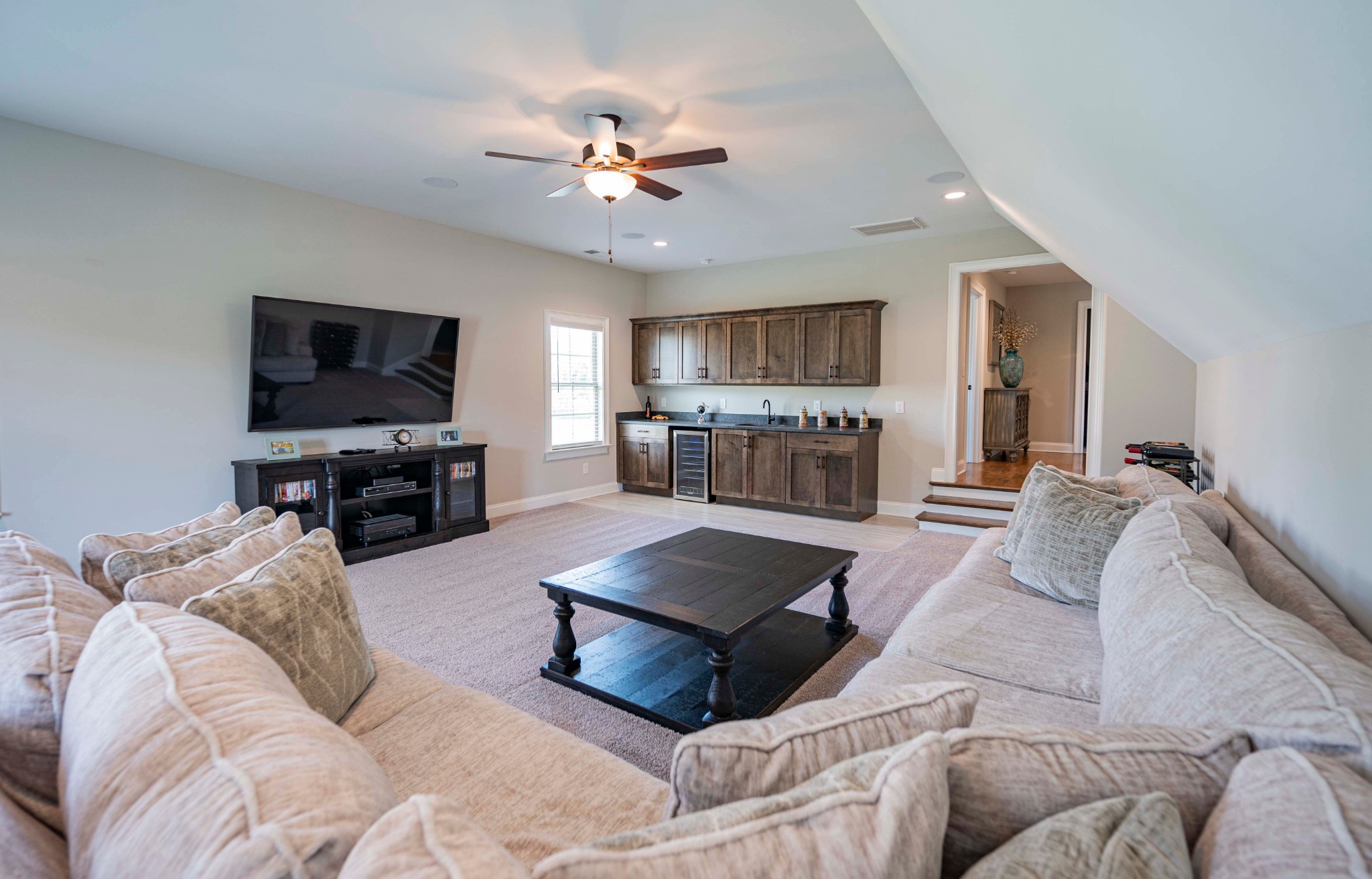 128 Seclusion Court Murfreesboro, TN 37129 - Photo 40 of 68 a living room with furniture and a flat screen tv