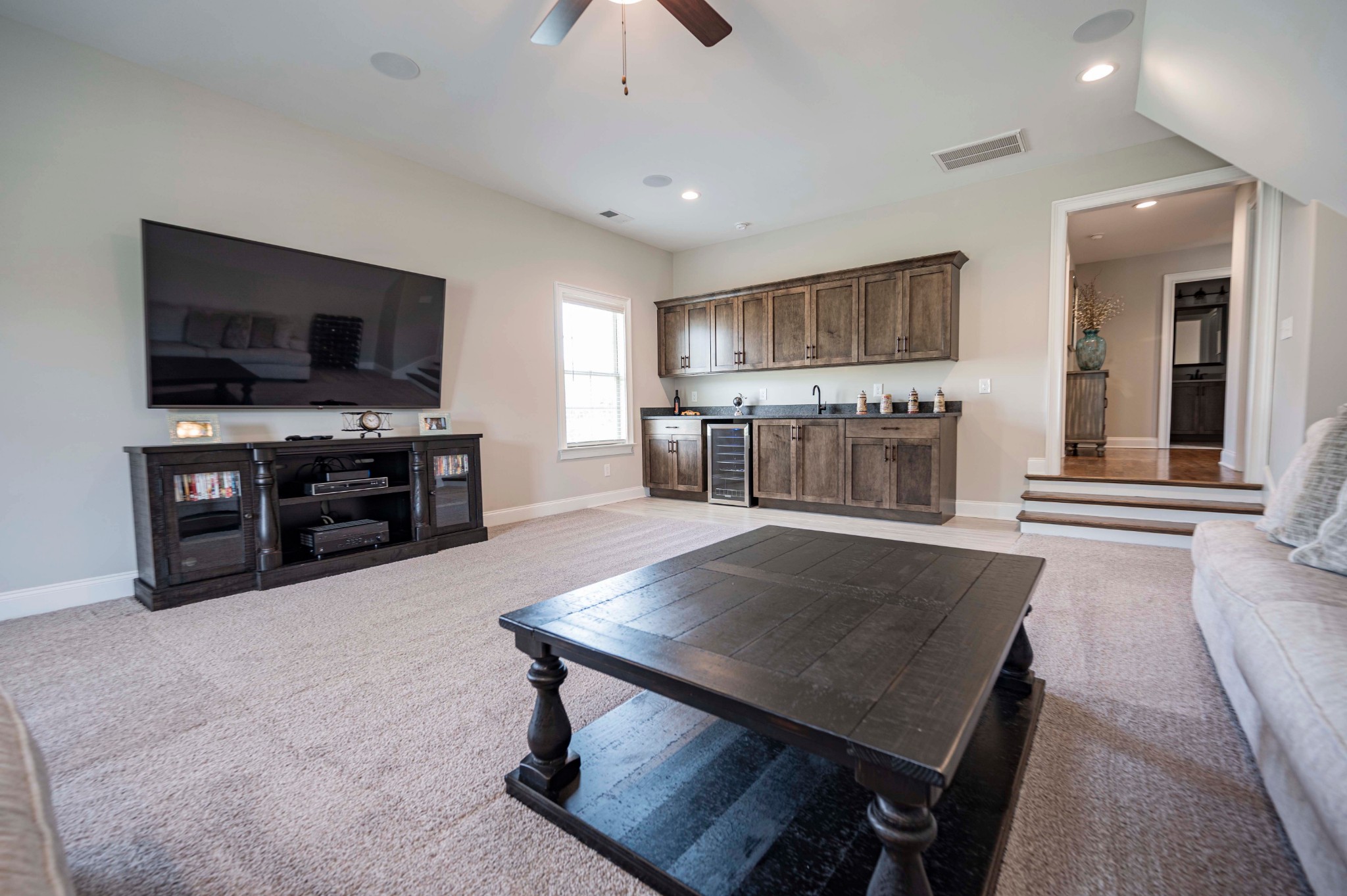 128 Seclusion Court Murfreesboro, TN 37129 - Photo 41 of 68 a living room with furniture and a flat screen tv
