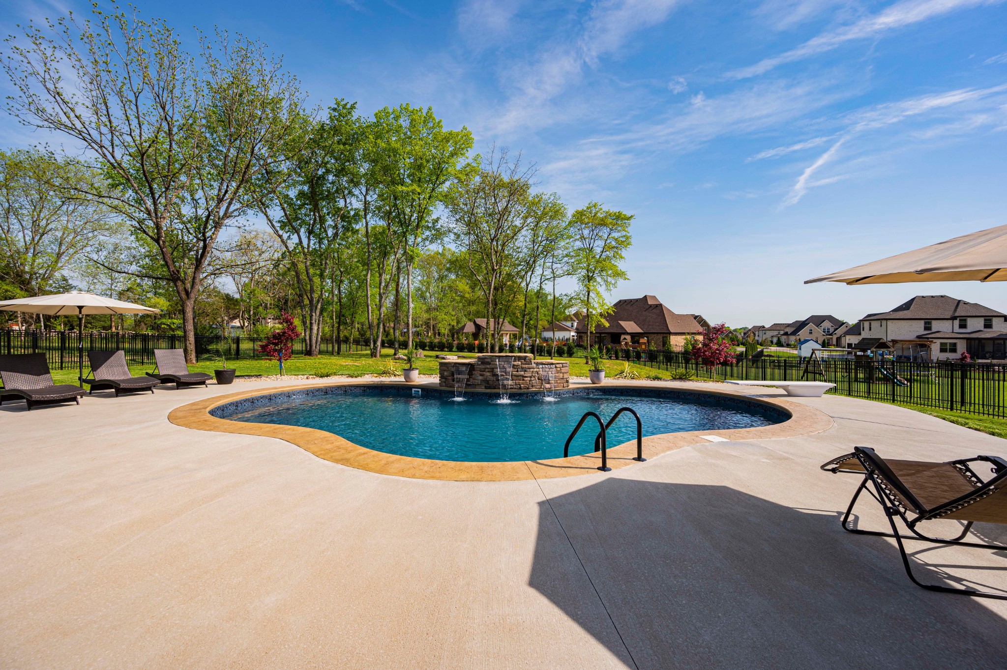 128 Seclusion Court Murfreesboro, TN 37129 - Photo 53 of 68 a view of swimming pool with outdoor seating and trees in the background