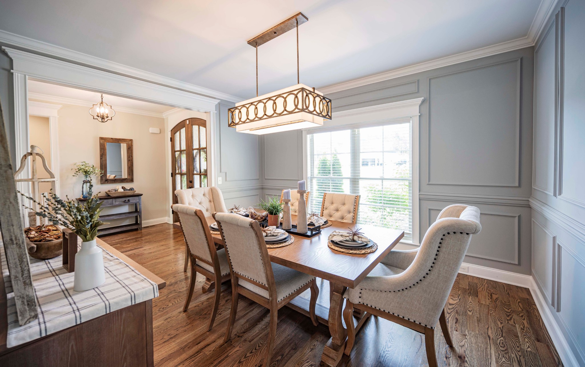 128 Seclusion Court Murfreesboro, TN 37129 - Photo 7 of 68 a dining room with furniture a chandelier and wooden floor
