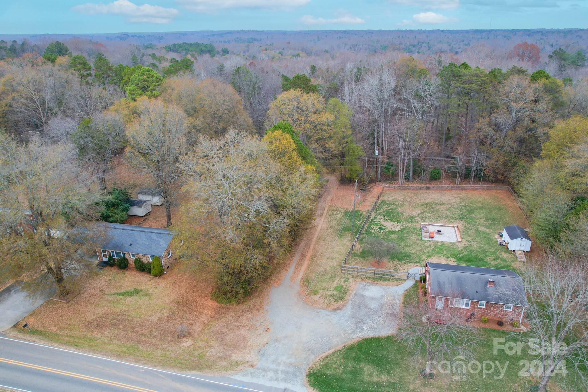 0 Dallas Spencer Mountain Road Dallas, NC 28034 - Photo 11 of 14 an aerial view of a house with a yard