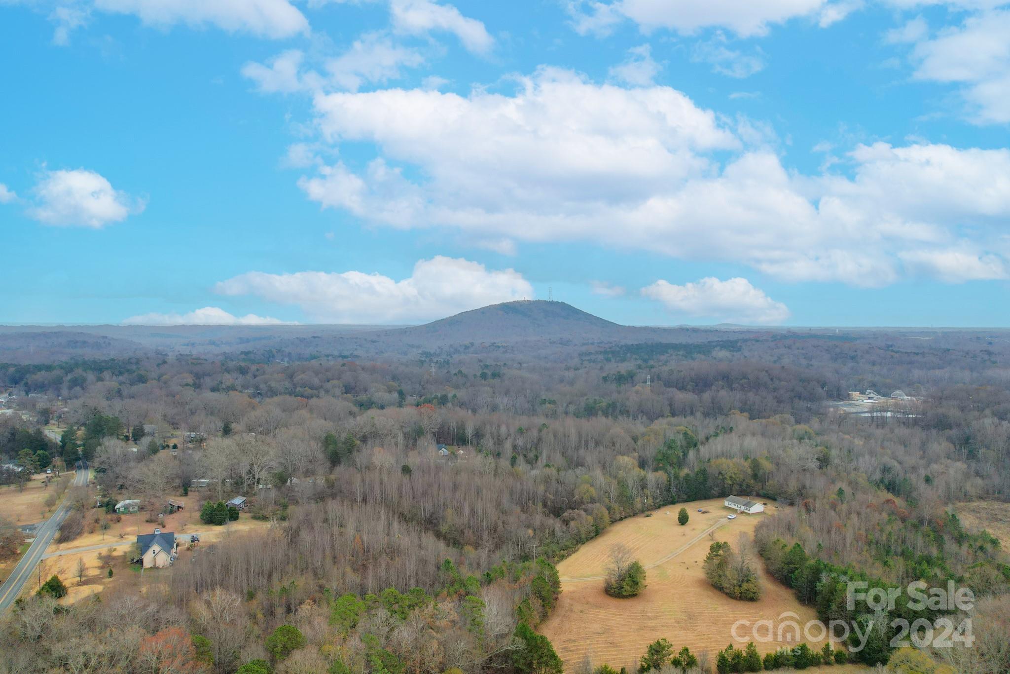 0 Dallas Spencer Mountain Road Dallas, NC 28034 - Photo 9 of 14 a view of a lake in middle of forest