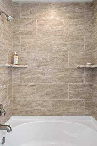 a bathroom with a bathtub