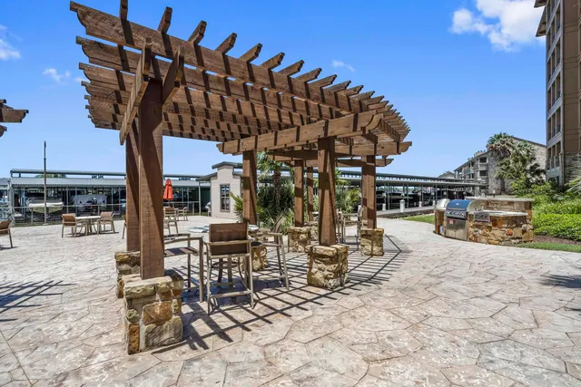 a view of a chairs and tables in the patio