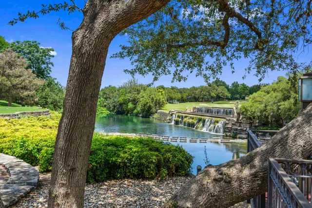 a view of a lake from a balcony
