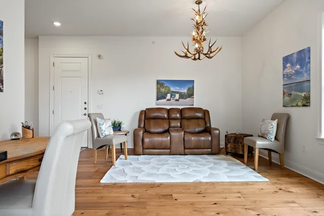 a room with furniture and a wooden floor