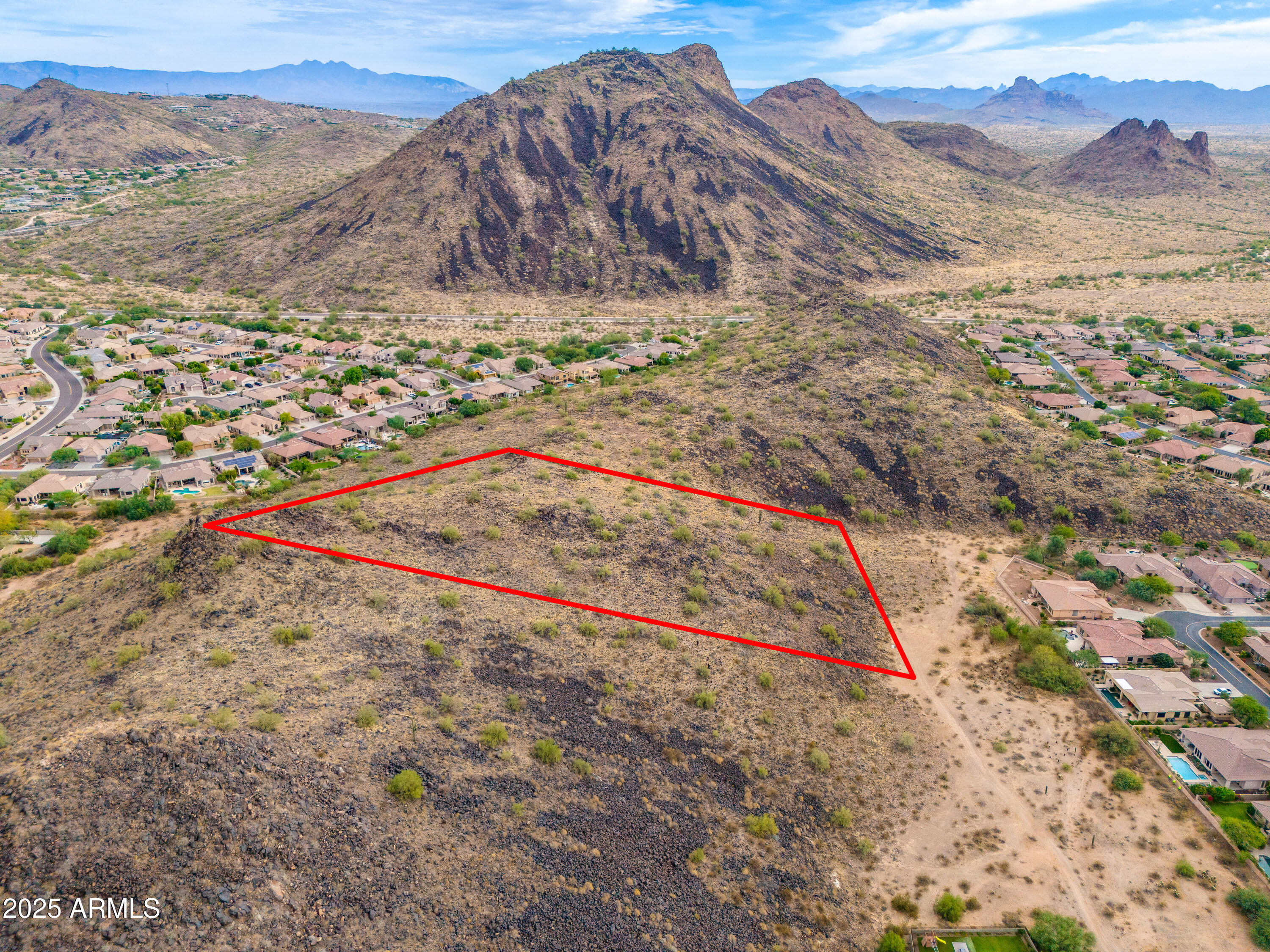 13358 East Mountain View Road Scottsdale, AZ 85259 - Photo 11 of 27 a view of a dry yard with mountains in the background