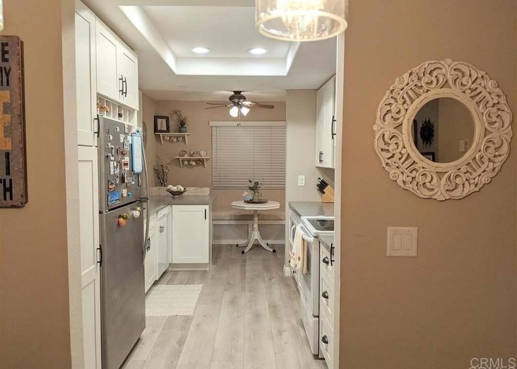 31908 Del Cielo Este, Unit 3A Bonsall, CA 92003 - Photo 3 of 8 a very nice looking room with a large window