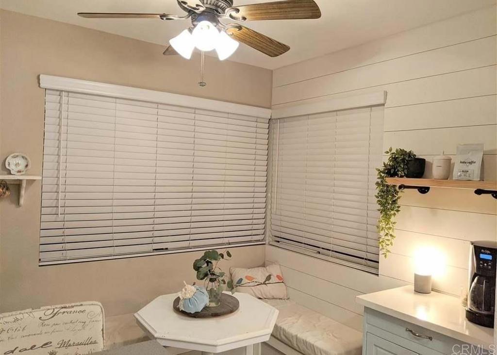 31908 Del Cielo Este, Unit 3A Bonsall, CA 92003 - Photo 6 of 8 a room with a table and chairs