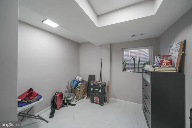 a view of a house with a backyard and deck