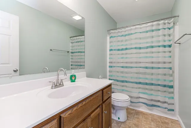 a view of balcony with wooden floor