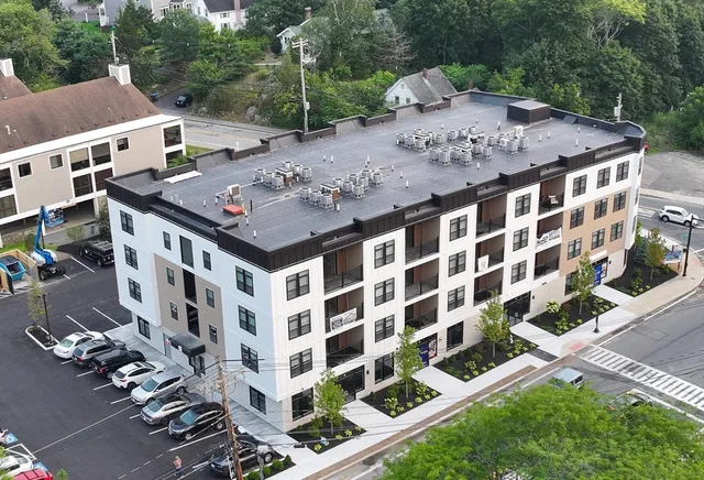 a view of a building with a garden