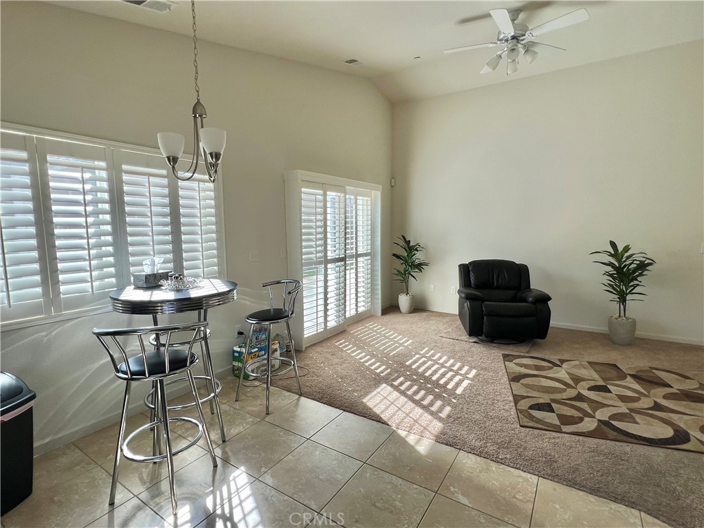 2185 Drake Avenue Merced, CA 95348 - Photo 17 of 34 a living room with furniture and a large window