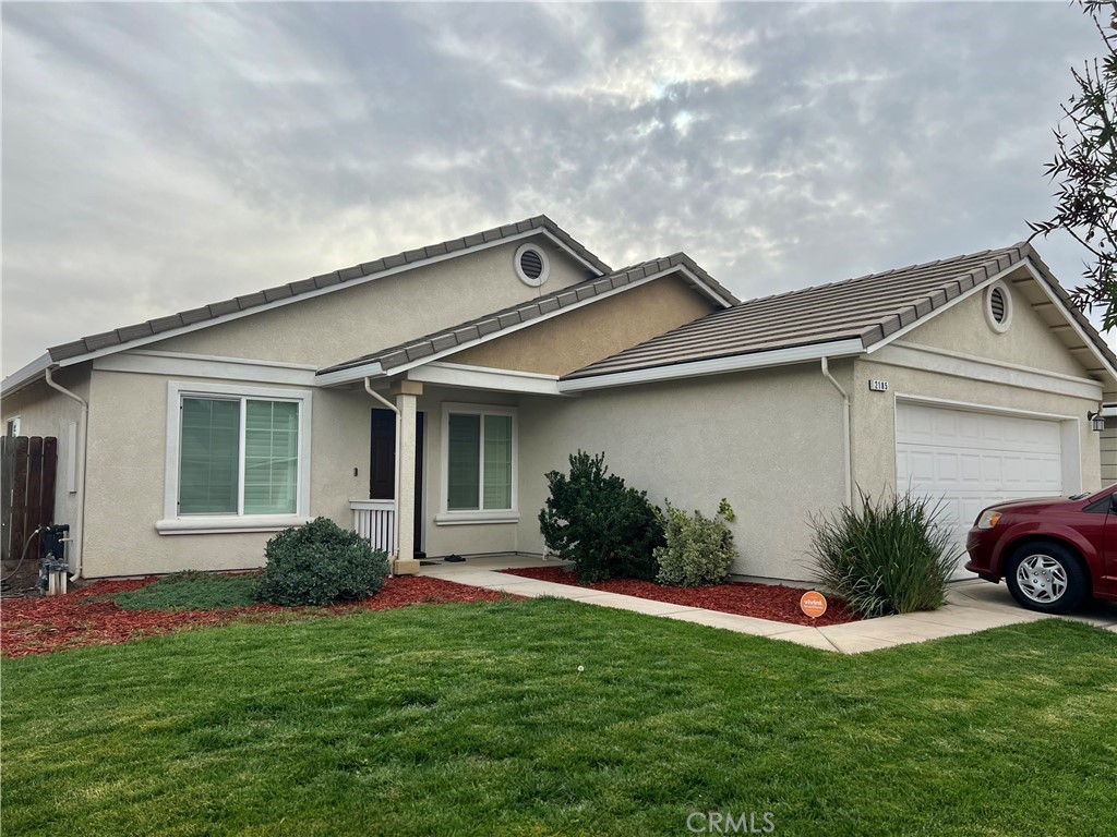 2185 Drake Avenue Merced, CA 95348 - Photo 3 of 34 a view of a house with a yard