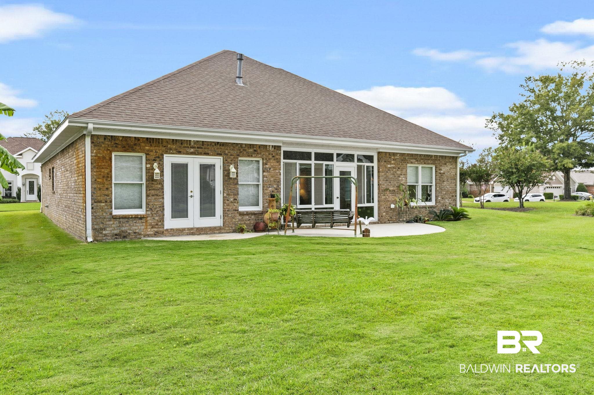 22512 Inverness Way Foley, AL 36535 - Photo 39 of 43 Rear view of property with french doors, a lawn, and a patio area
