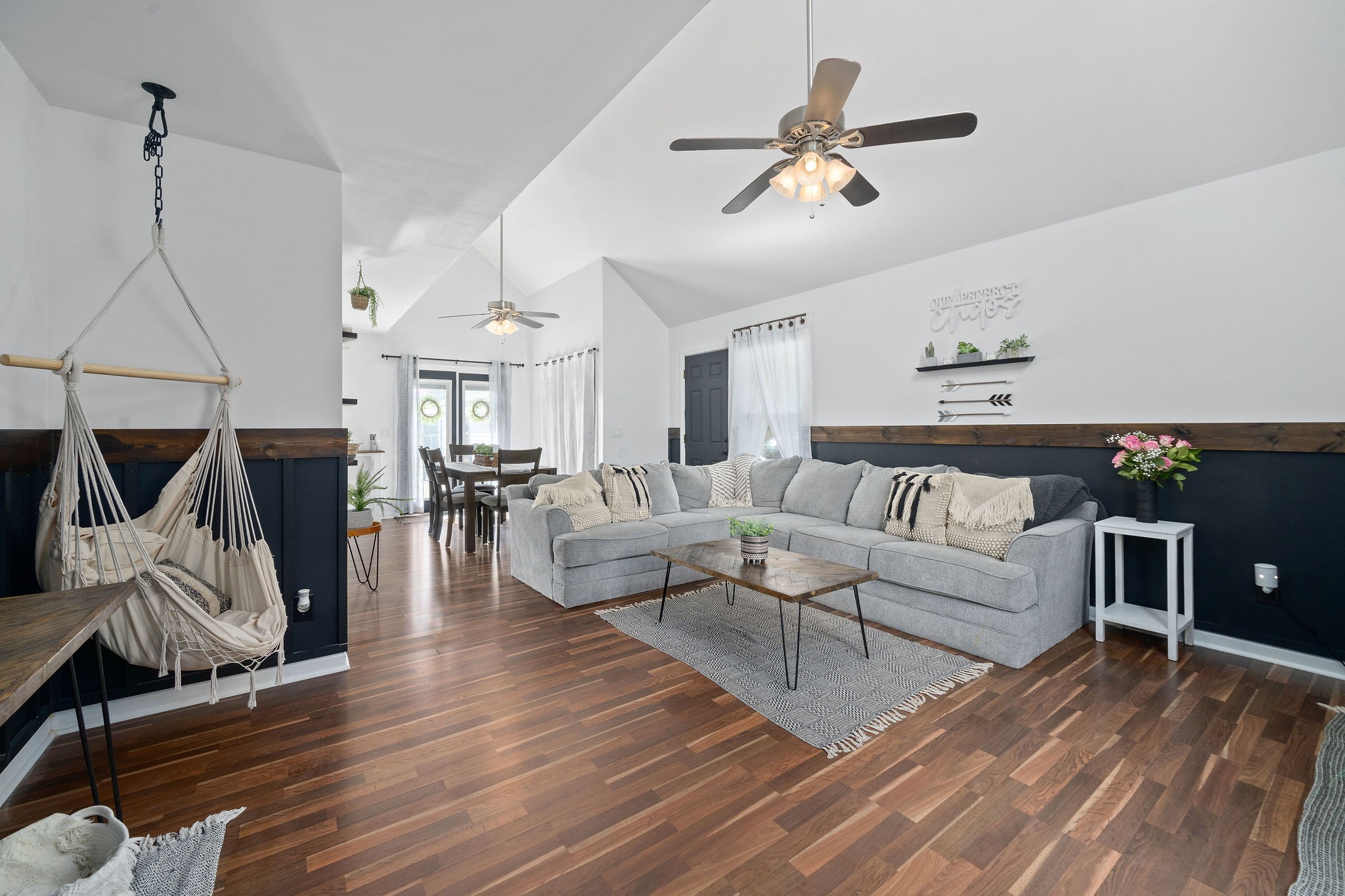 6041 Ebenezer Road Greenbrier, TN 37073 - Photo 2 of 29 a living room with furniture ceiling fan and a rug