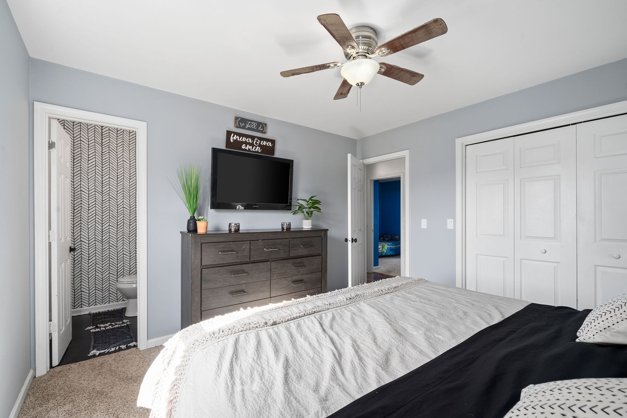 6041 Ebenezer Road Greenbrier, TN 37073 - Photo 13 of 29 a bedroom with a bed and a flat screen tv
