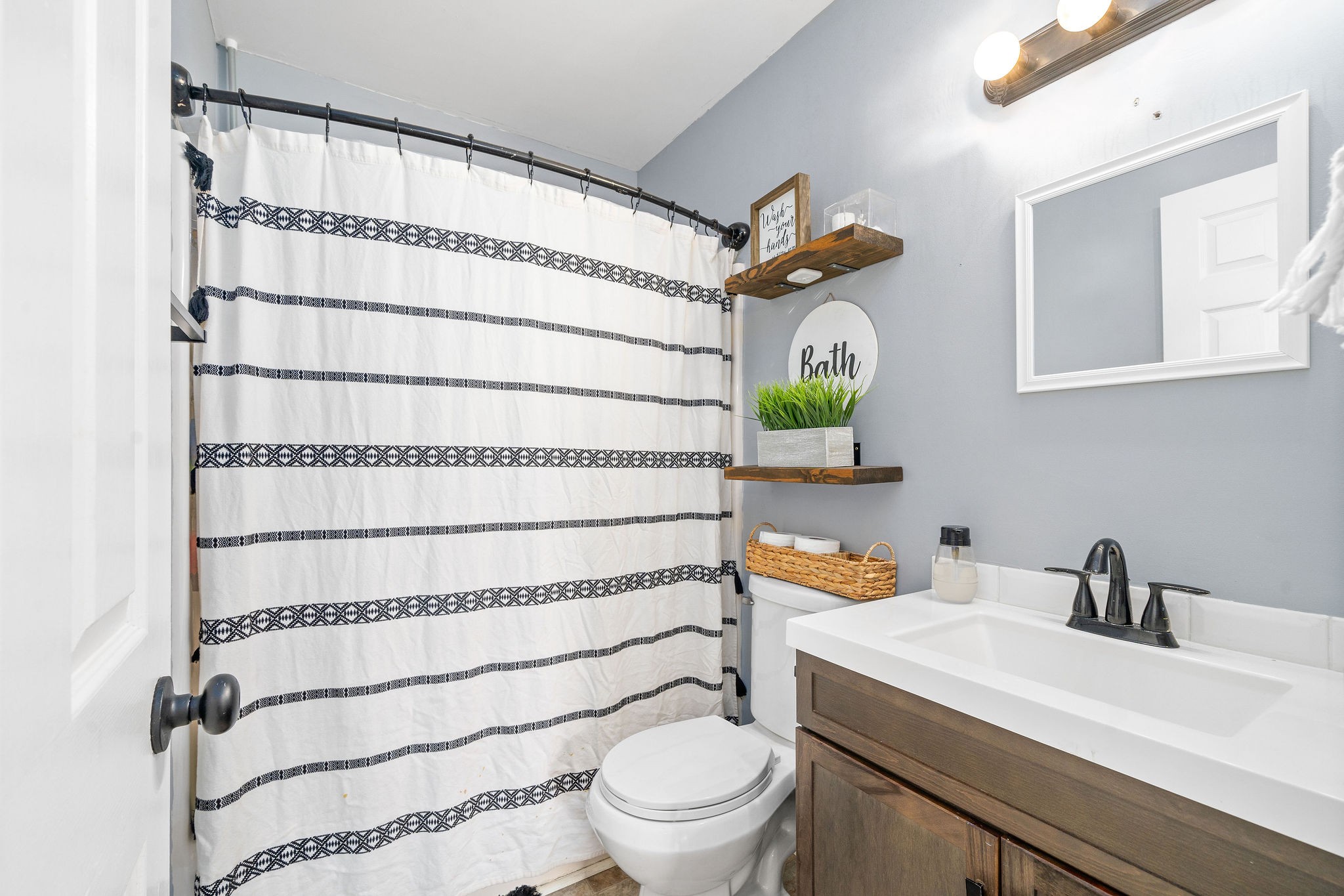 6041 Ebenezer Road Greenbrier, TN 37073 - Photo 16 of 29 a bathroom with a sink and a toilet