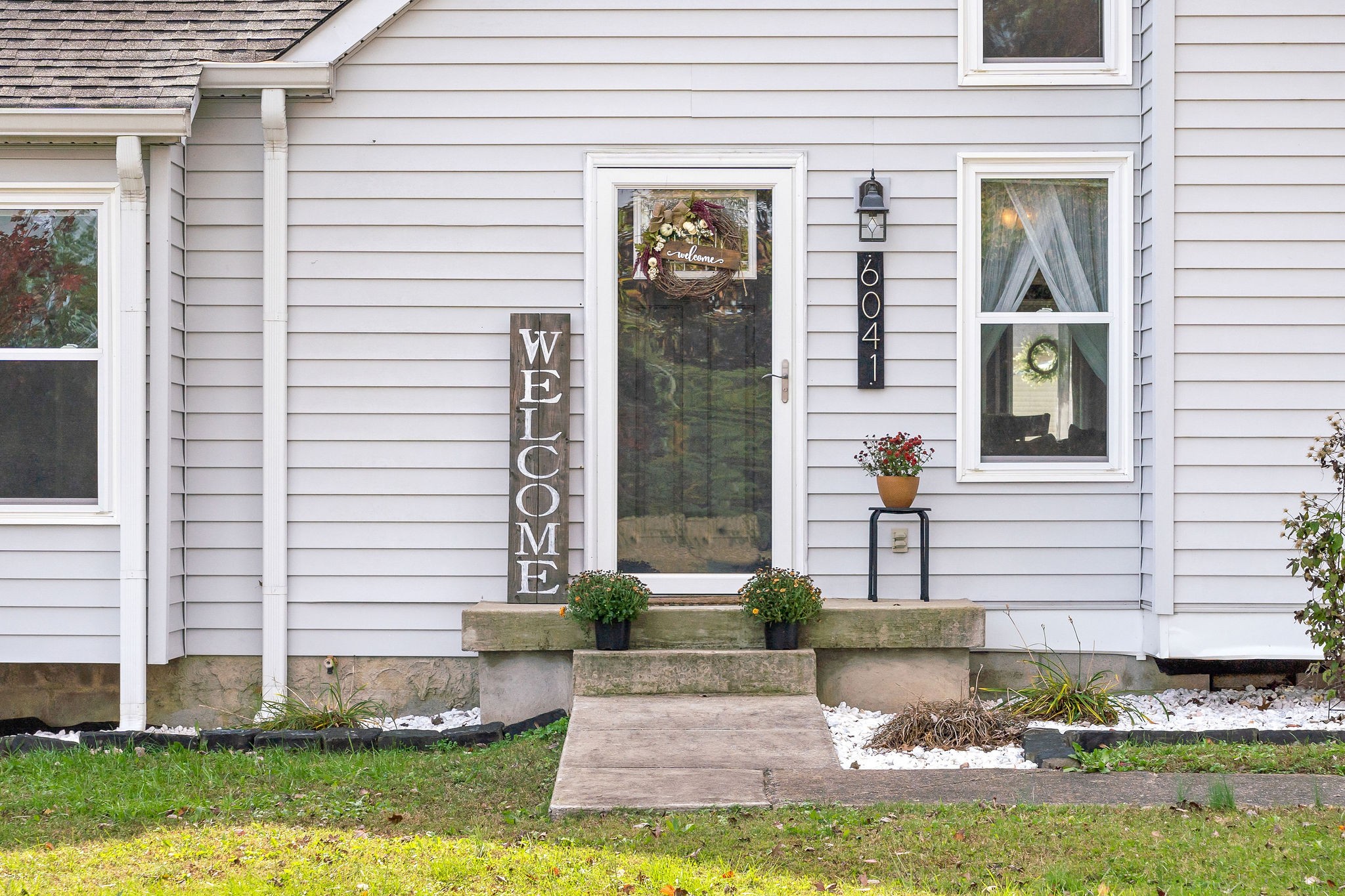 6041 Ebenezer Road Greenbrier, TN 37073 - Photo 20 of 29 a front view of a house with a yard and garage