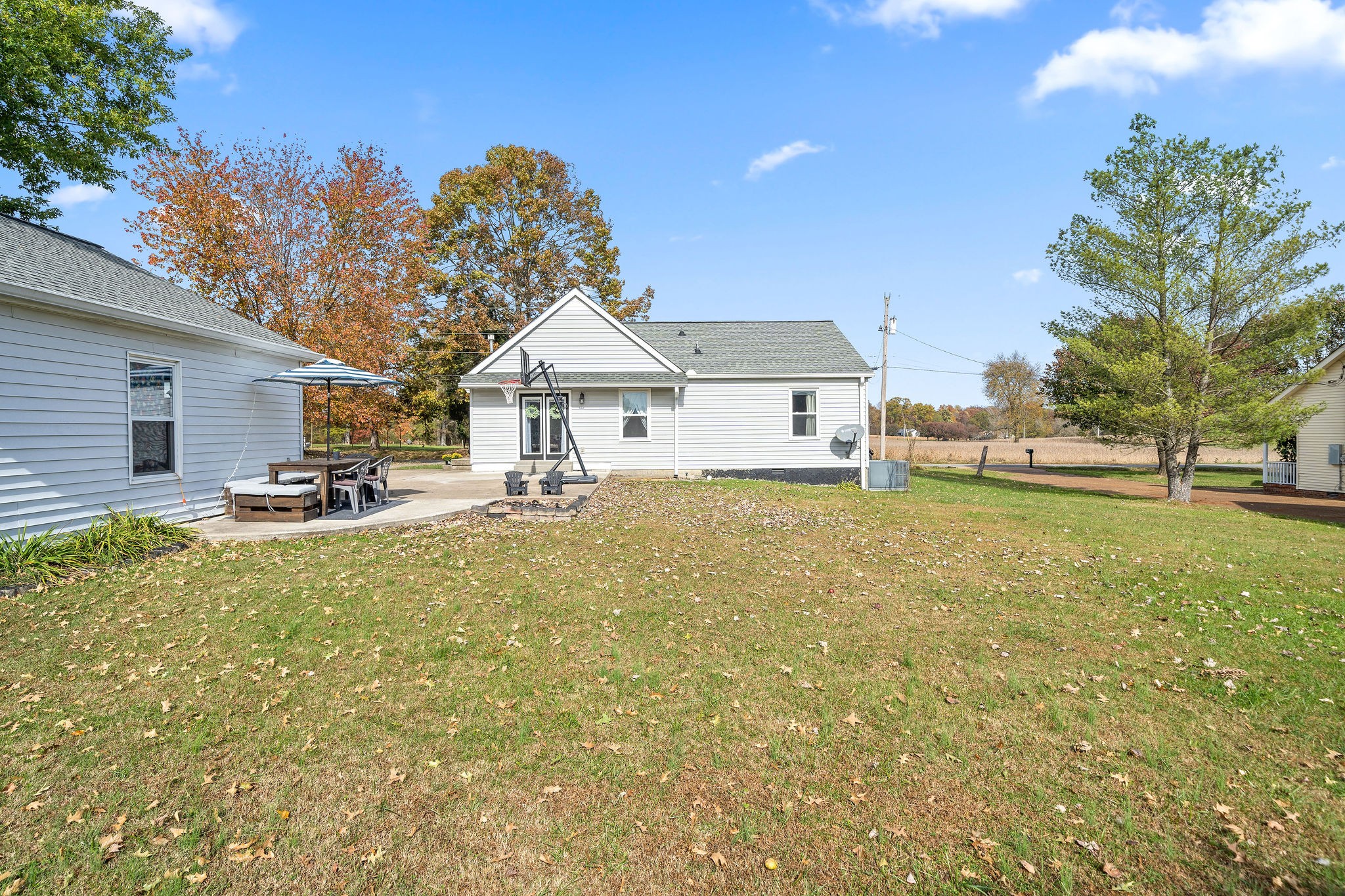 6041 Ebenezer Road Greenbrier, TN 37073 - Photo 28 of 29 a house view with swimming pool and trees in the background
