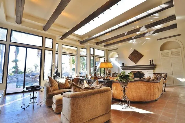 a kitchen with stainless steel appliances granite countertop sink stove and refrigerator