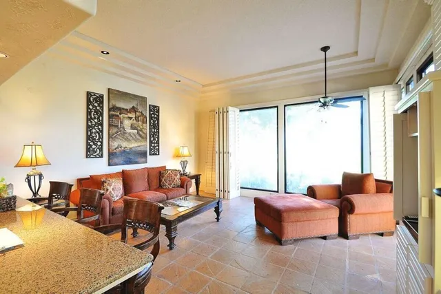 a kitchen with a refrigerator and a stove