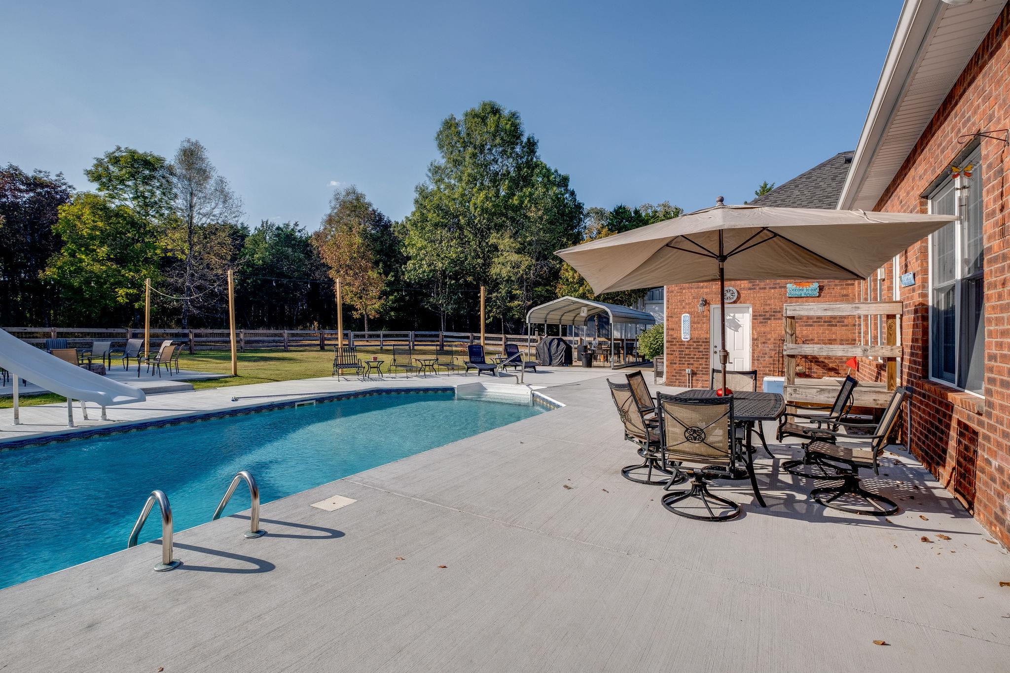 2700 Lone Oak Road Mount Juliet, TN 37122 - Photo 20 of 30 a view of a swimming pool with sitting area and furniture