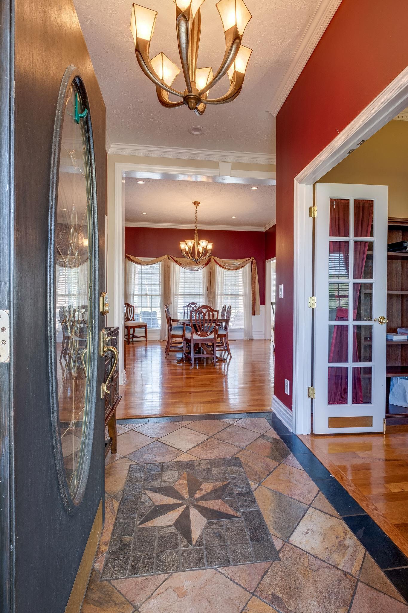 2700 Lone Oak Road Mount Juliet, TN 37122 - Photo 4 of 30 a view of water heater room with fireplace and chandelier