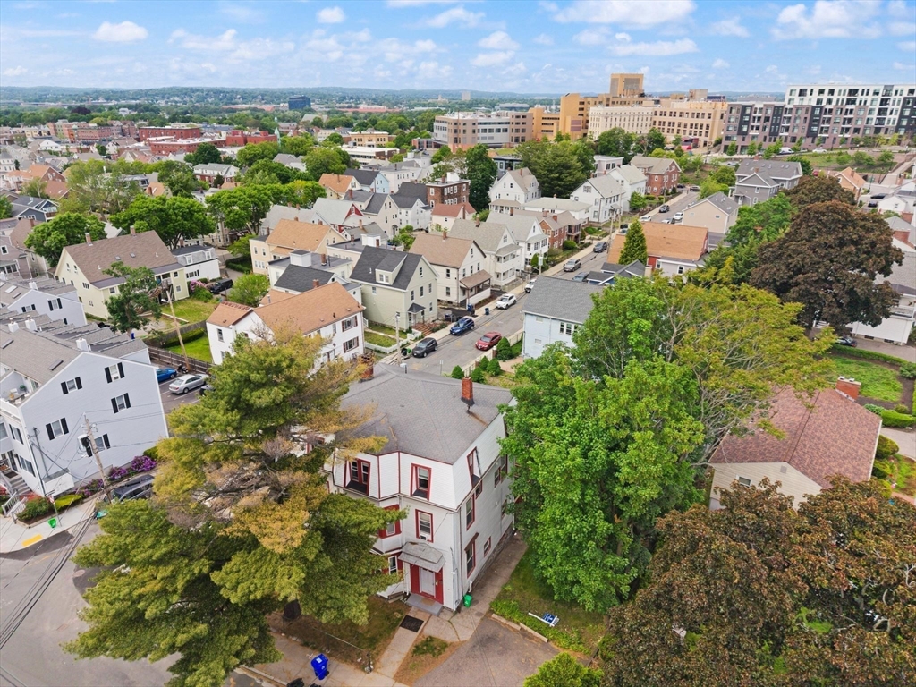 39 Union Street Boston, MA 02135 - Photo 29 of 33 an aerial view of a city with lots of residential buildings