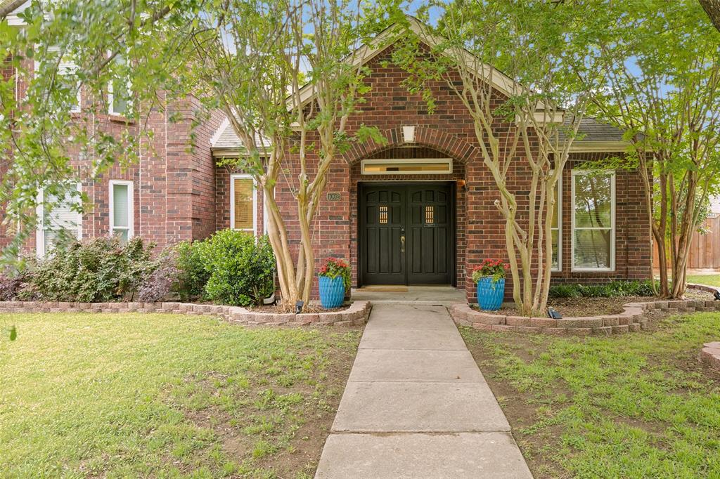 1002 Charter Oak Street Allen, TX 75002 - Photo 1 of 1 through a canopy of trees Charter Oak welcomes