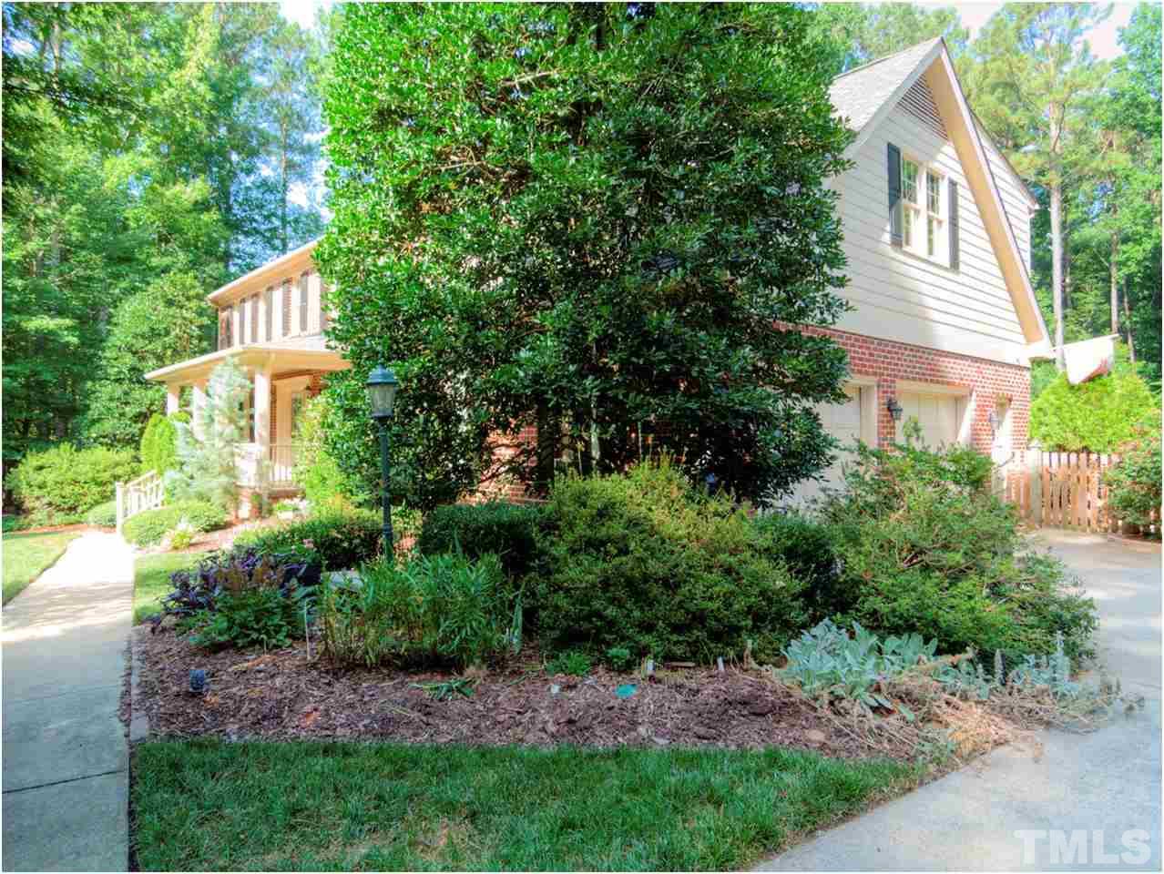 4709 Fallswood Place Raleigh, NC 27613 - Photo 3 of 25 a view of a house with a yard