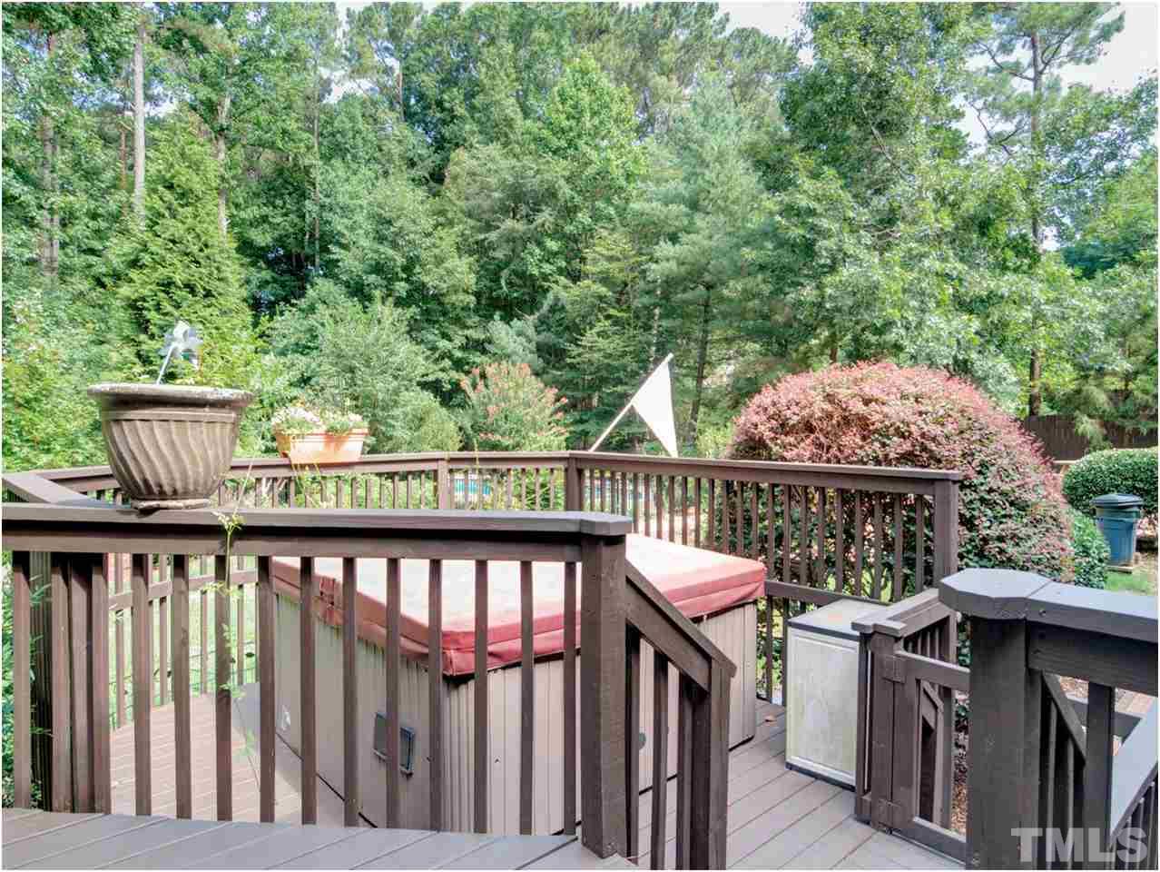 4709 Fallswood Place Raleigh, NC 27613 - Photo 5 of 25 a view of a balcony with wooden floor