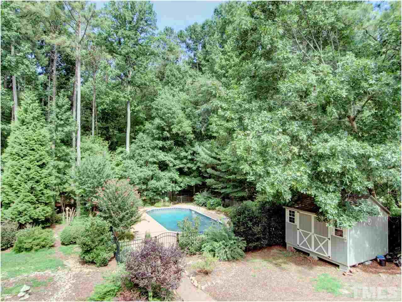 4709 Fallswood Place Raleigh, NC 27613 - Photo 8 of 25 a view of a garden with plants