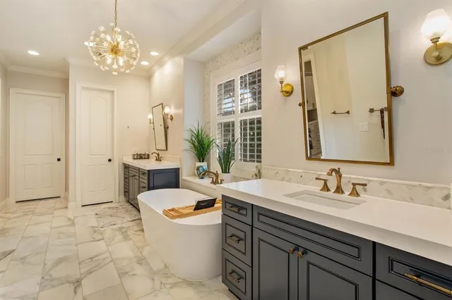 a bathroom with a sink double vanity and a mirror