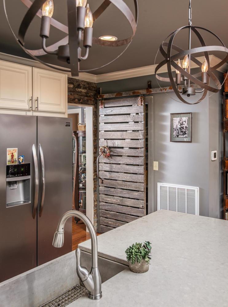 401 Page Road Nashville, TN 37205 - Photo 14 of 30 Reclaimed barnwood door hides your walk in pantry!
