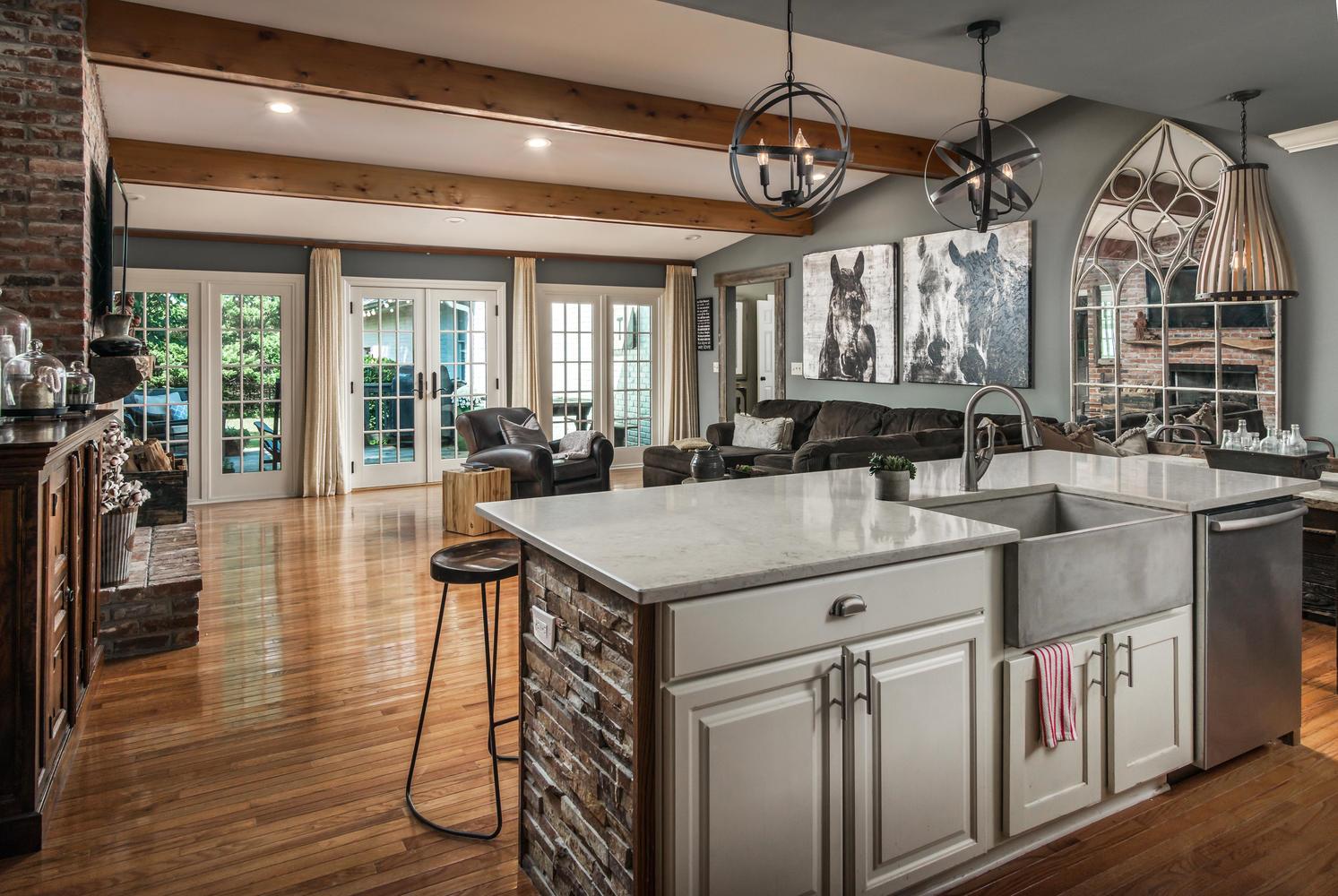 401 Page Road Nashville, TN 37205 - Photo 3 of 30 New farmhouse sink! Gleaming Hardwoods! Vaulted Ceiling with Beautiful Beams! Gorgeous french doors lead to the deck and screened porch - the perfect spot for grilling and enjoying the fenced backyard!