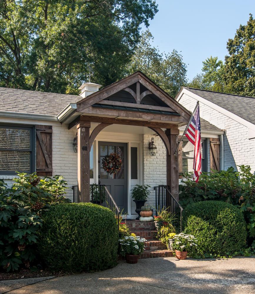 401 Page Road Nashville, TN 37205 - Photo 8 of 30 Brand new custom made cedar shutters frame all of the windows! New cedar arches and supports for the covered side entry porch help create the most inviting welcome for your family and guests.