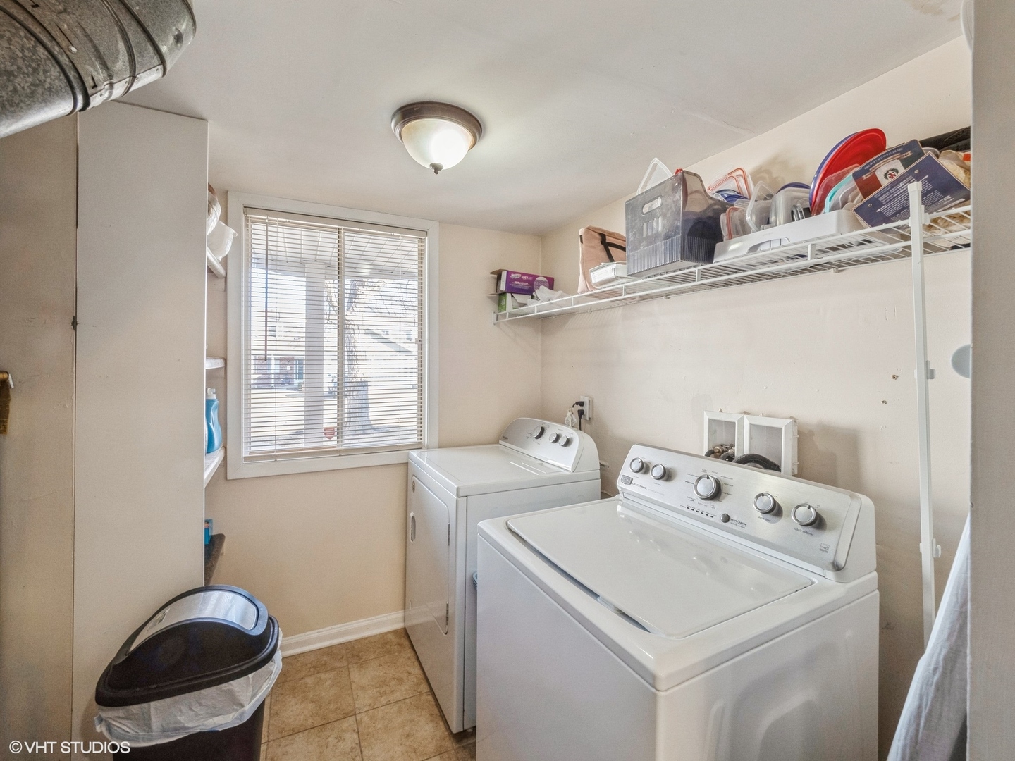 2012 Raleigh Place Hoffman Estates, IL 60169 - Photo 12 of 14 a utility room with dryer and washer