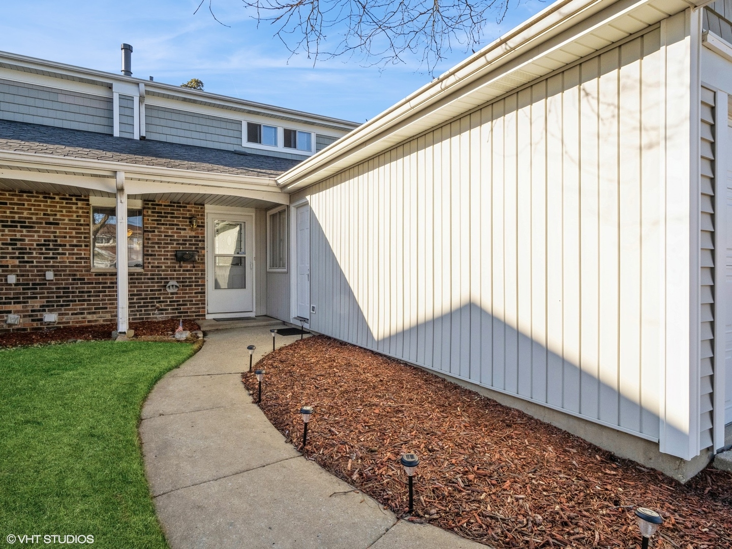 2012 Raleigh Place Hoffman Estates, IL 60169 - Photo 2 of 14 a view of a backyard with pathway
