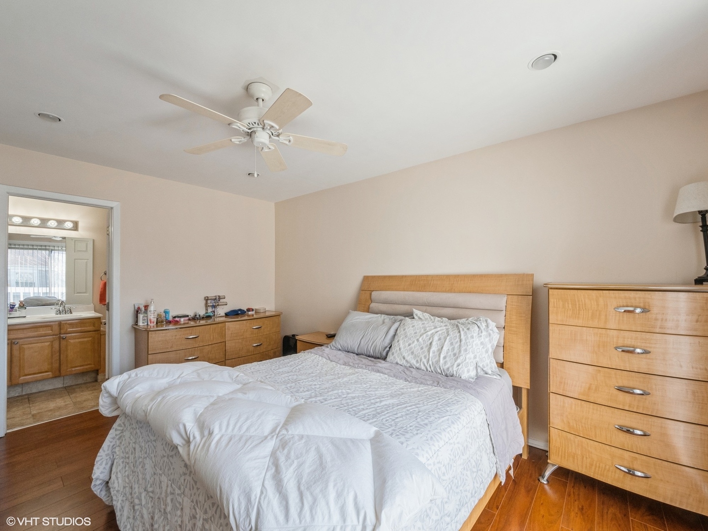 2012 Raleigh Place Hoffman Estates, IL 60169 - Photo 9 of 14 a bedroom with a bed and wooden floor