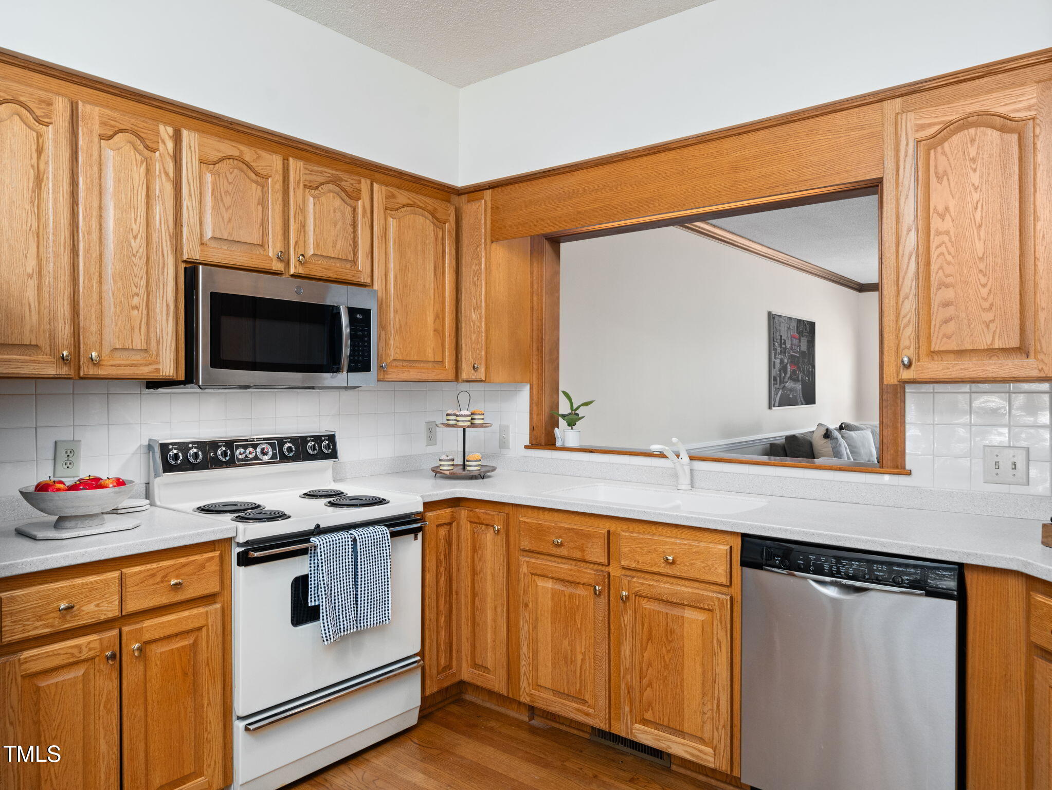 2610 Sawmill Road Raleigh, NC 27613 - Photo 8 of 25 Passthrough Window Keeps Conversations Flowing
