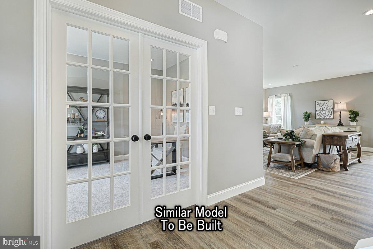 2010 Settlers Ridge Road Slatington, PA 18080 - Photo 5 of 21 a view of a livingroom with furniture and hardwood floor