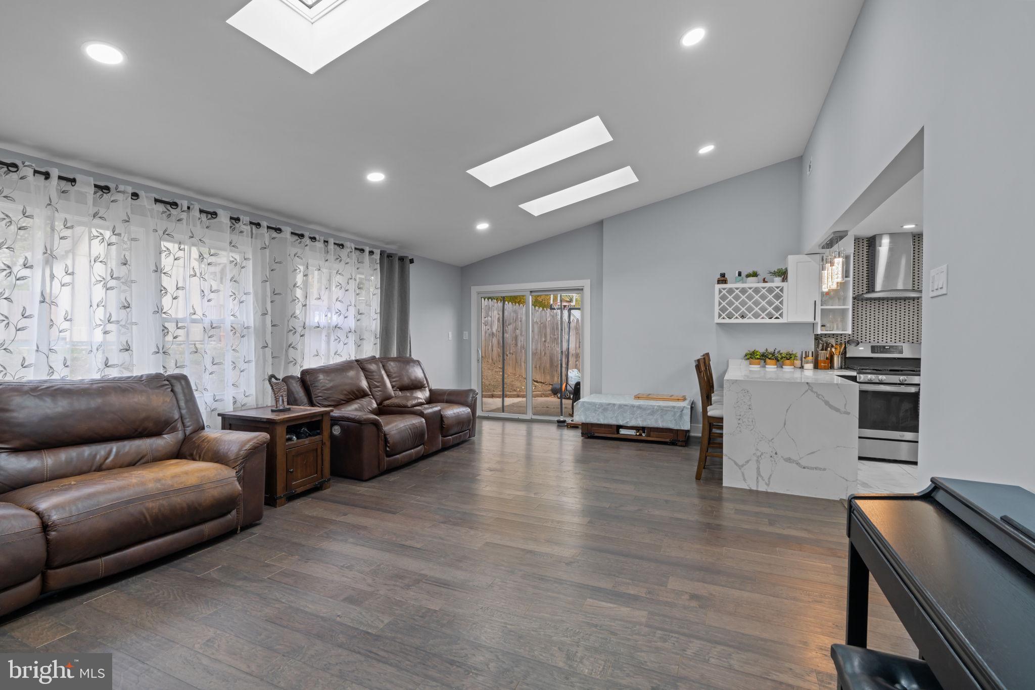 245 Trenton Road Fairless Hills, PA 19030 - Photo 16 of 43 a living room with furniture and a wooden floor