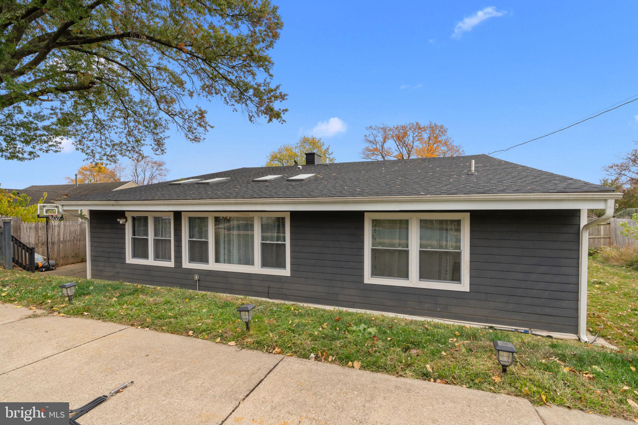 245 Trenton Road Fairless Hills, PA 19030 - Photo 23 of 43 a front view of a house with a garden