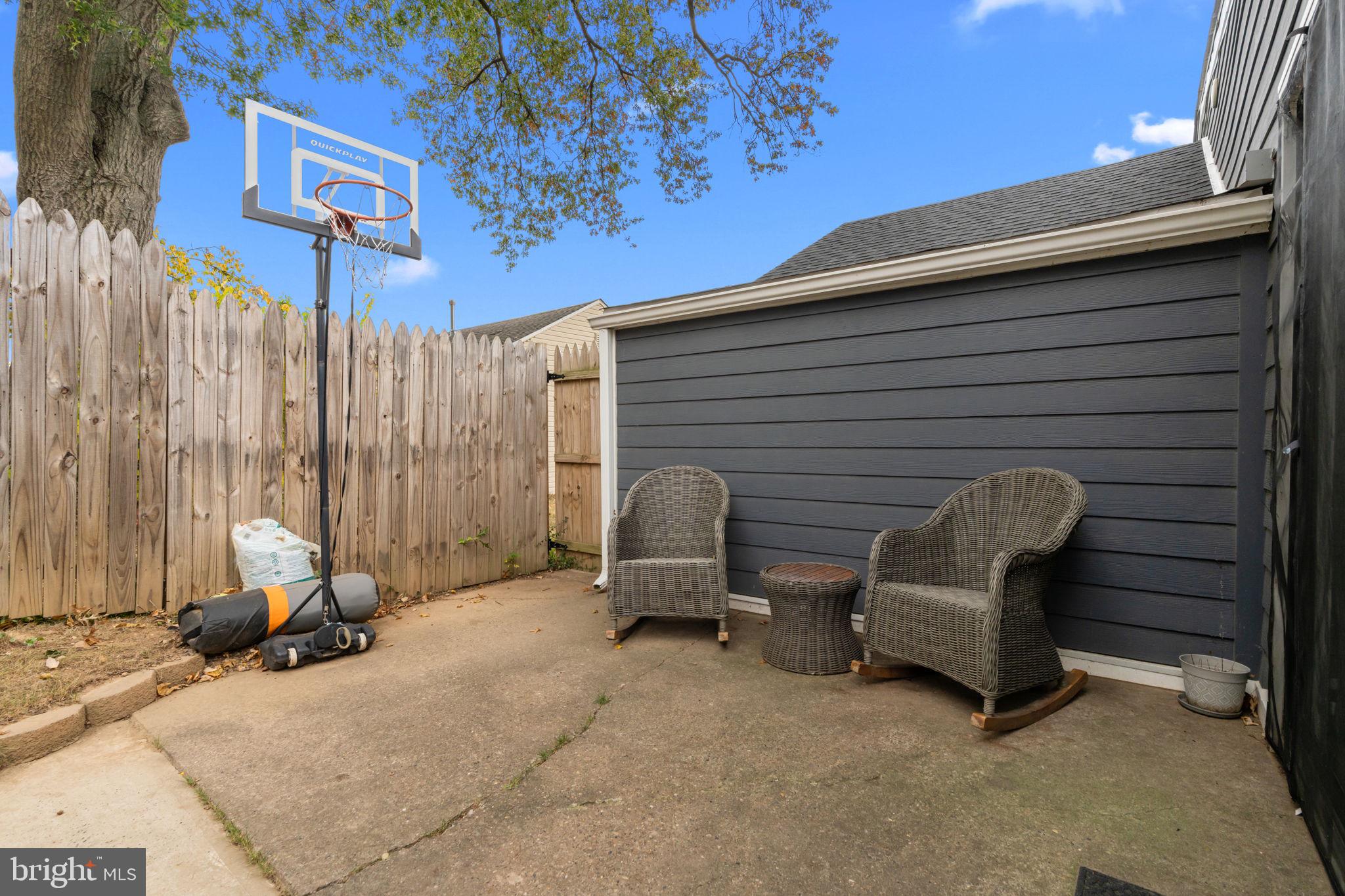 245 Trenton Road Fairless Hills, PA 19030 - Photo 30 of 43 a view of backyard with outdoor seating and stairs