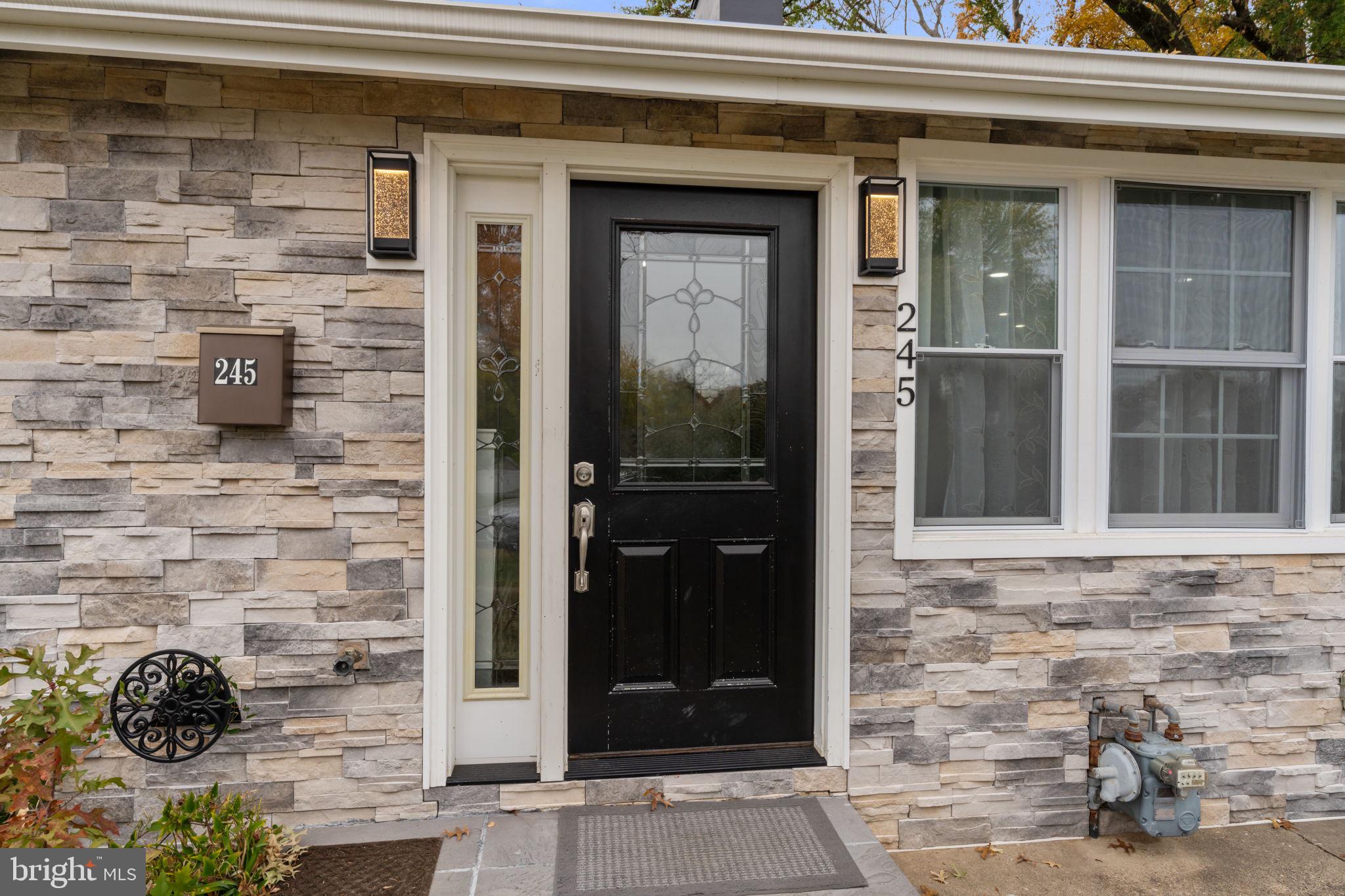 245 Trenton Road Fairless Hills, PA 19030 - Photo 3 of 43 a front view of a house with a potted plant