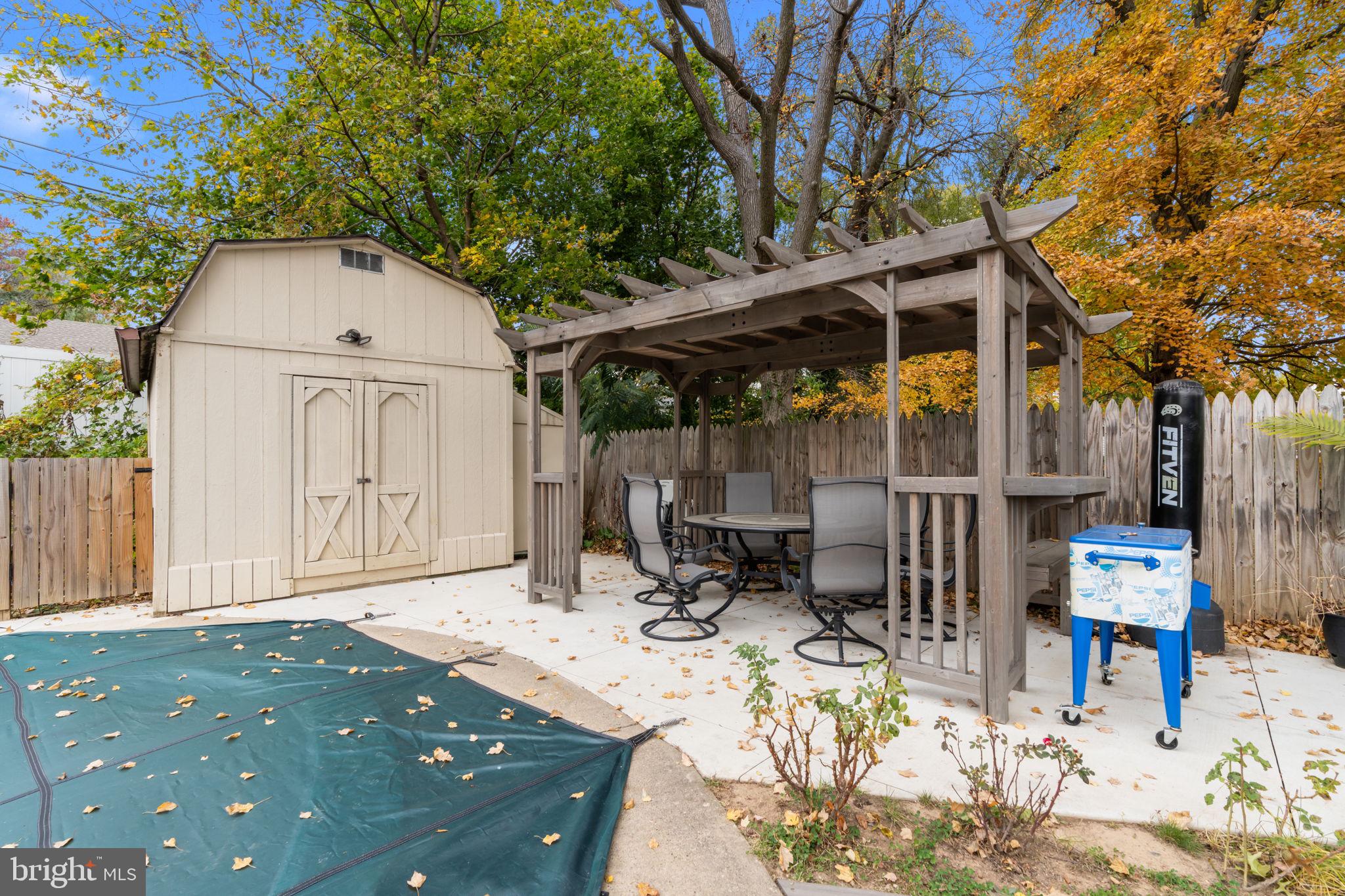 245 Trenton Road Fairless Hills, PA 19030 - Photo 32 of 43 a view of backyard with a patio and outdoor seating
