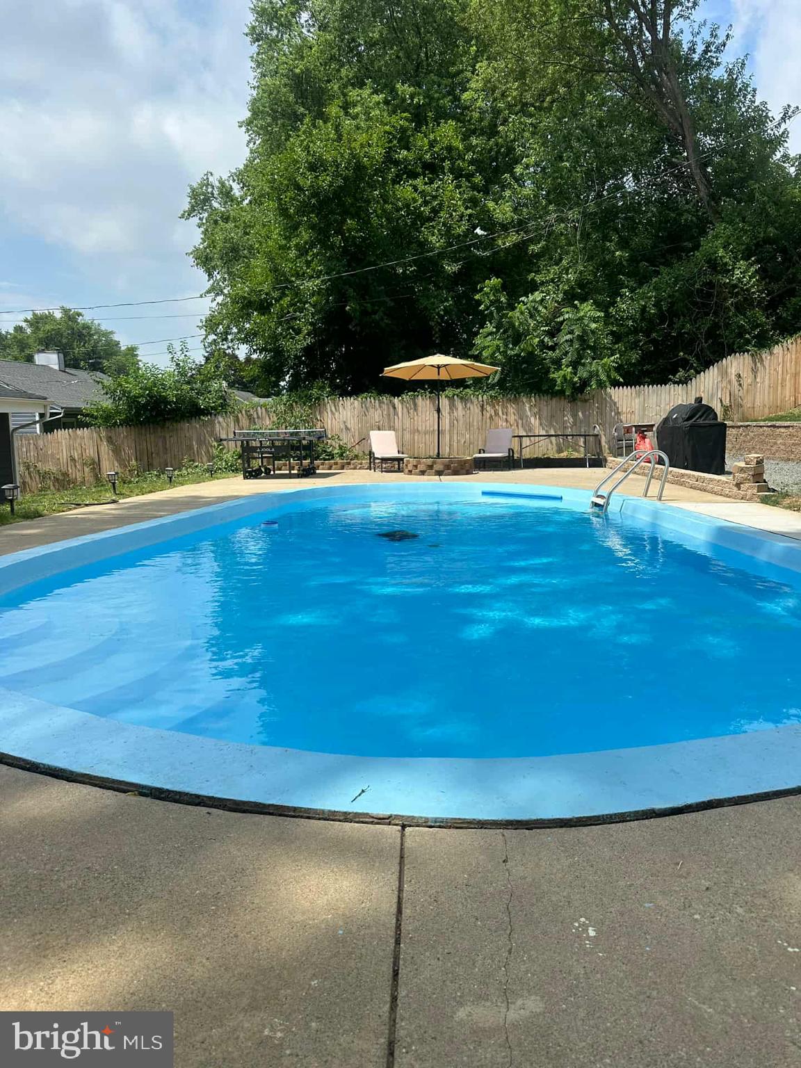 245 Trenton Road Fairless Hills, PA 19030 - Photo 33 of 43 a view of a swimming pool with a yard